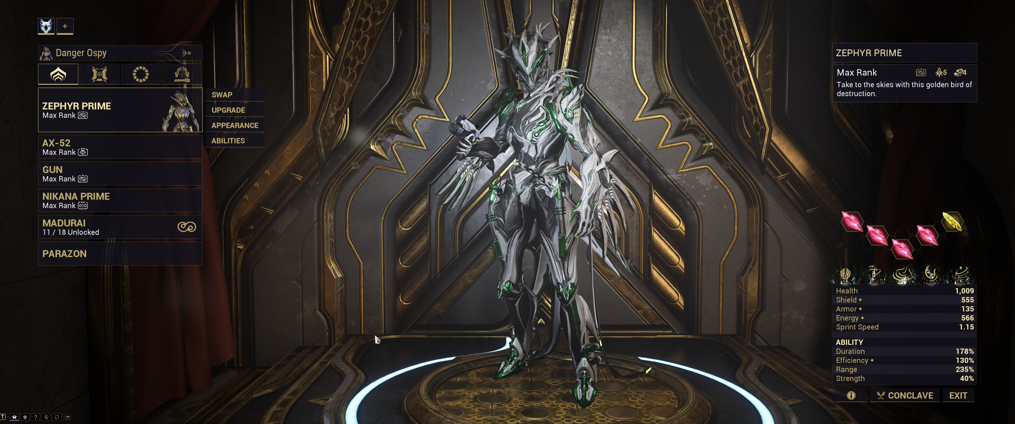 In-Game screenshot of Warframe, showing a loadout for the Zephyr Prime Warframe. A faceless humanoid clad in very form-fitting white-and-green armor is holding a handgun. The armor features many metallic protrusions including wing-like appendages on the arms and a sharp-edged helmet